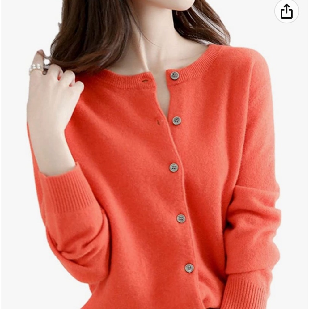 Pretty orange button up long sleeves sweater, never worn.